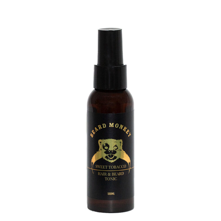 Beard Monkey Hair & Beard Tonic Sweet Tobacco – svart sprayflaska med guldiga detaljer och en gyllene apa på etiketten.
