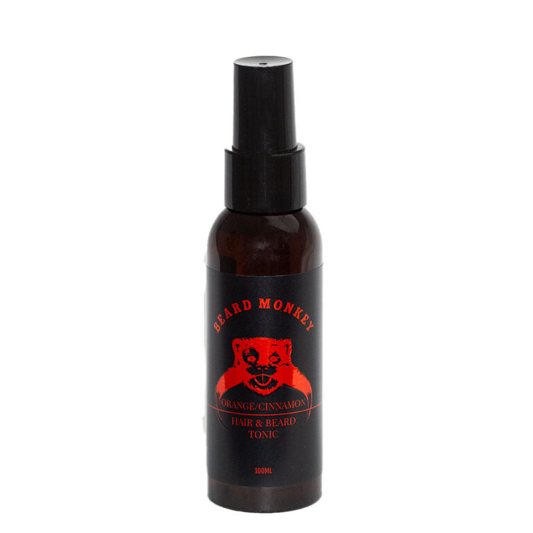 Beard Monkey Hair & Beard Tonic Orange/Cinnamon – svart sprayflaska med röda detaljer och en röd apa på etiketten.