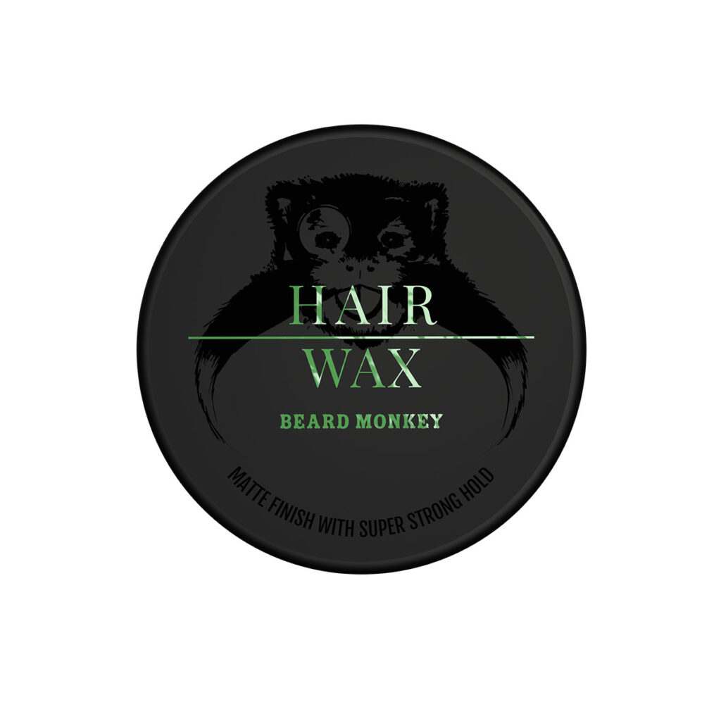 Svart Beard Monkey Hair Wax burk med glansig svart logga och gröna detaljer. Hårvax med maximal stadga och matt finish för korta till medellånga frisyrer.