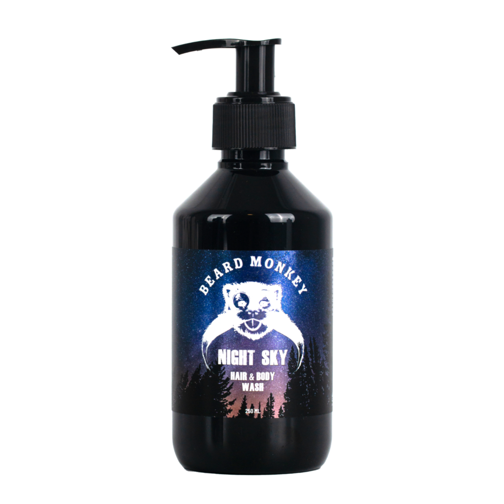 Beard Monkeys Hair & Body Wash i doften Night Sky. En svart pumpflaska om 250ml med blå och rosa stjärnhimmel på etiketten och vit text.